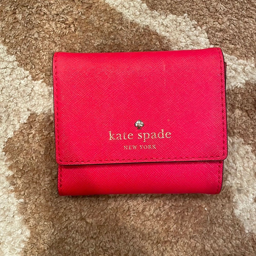 kate spade pocket wallet in red